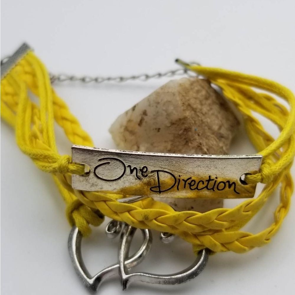 Vintage one direction yellow braided bracelet‎